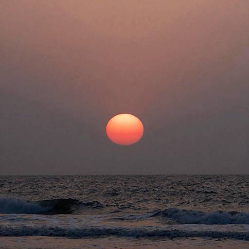 Red Molten Sun Over Ocean at Dusk
