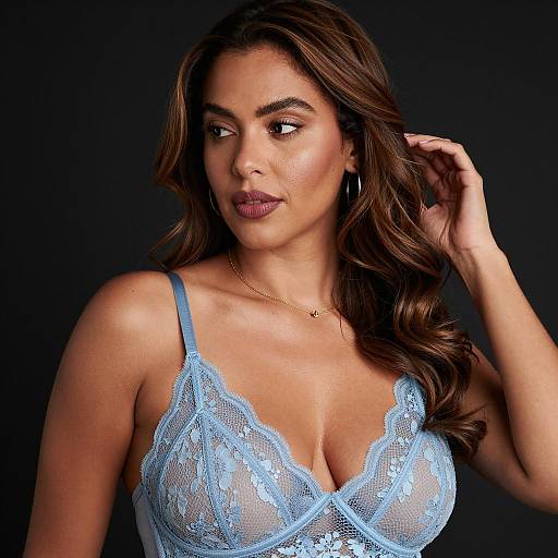 Woman in Light Blue Lace Bra with Brown Wavy Hair