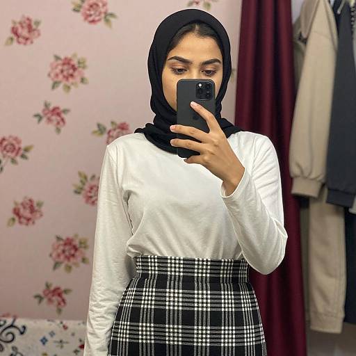 Young Woman Taking Mirror Selfie