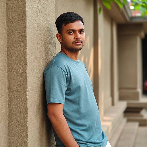 Modern Indian Man by Ancient Temple