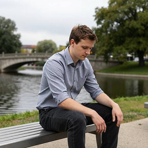 Reflective Man by a Serene Lake