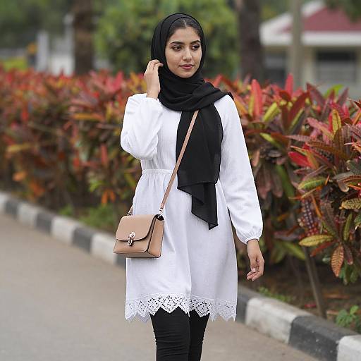 Young Woman in Black Hijab Outdoors