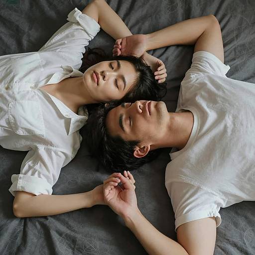 Intimate Couple on Patterned Bed