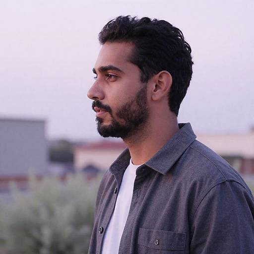 Profile Portrait Against Pink Purple Sky