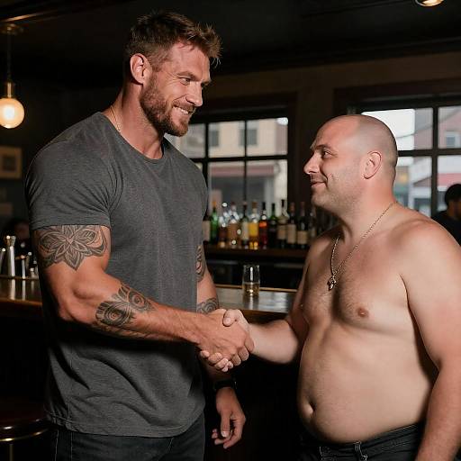 Men Shaking Hands in Dim Bar