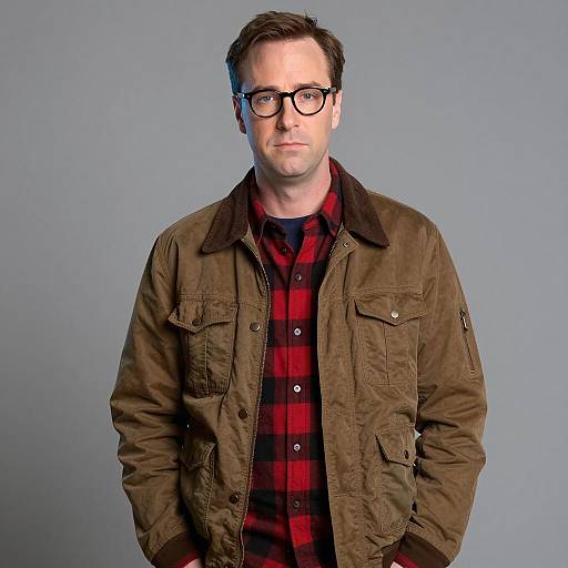 Young man in brown jacket and plaid shirt