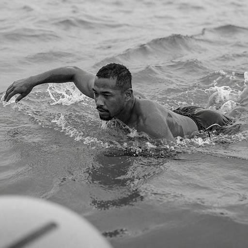 Black-and-White Muscular Swimmer in Turbulence