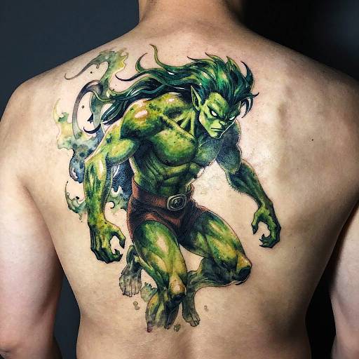 Tattoo of a muscular, green-skinned, werewolf-like creature with wild black hair, glowing eyes, and brown loincloth on a