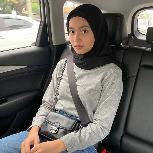 Young Asian Woman in Car Seatbelt