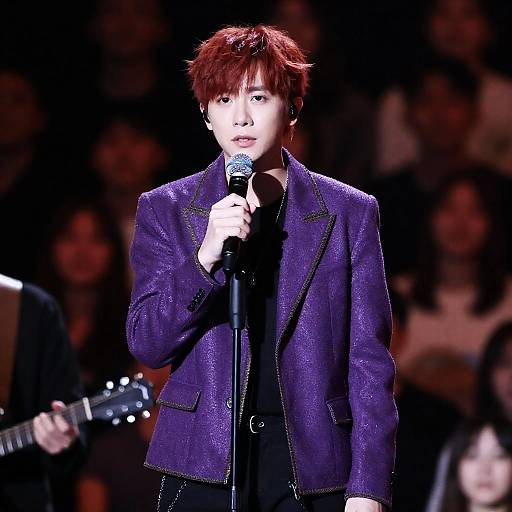 Serious Male Singer on Stage Performance
