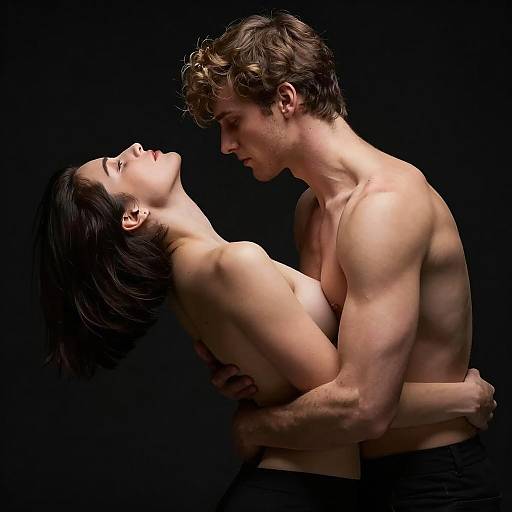 Intimate Couple Pose on Dark Background