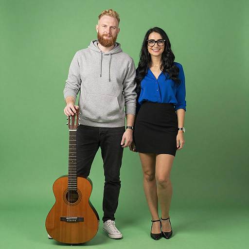 Playful Couple Holding Guitar Portrait