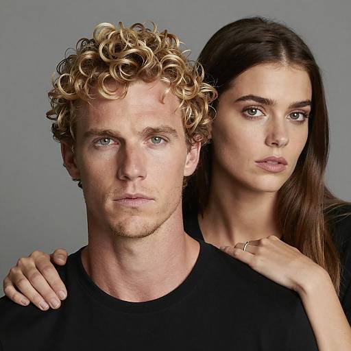 Intense Couple Portrait on Gray Background