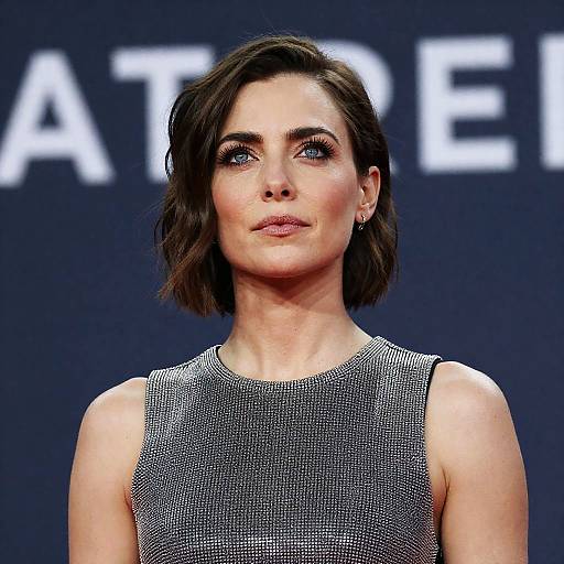 Serious Woman in Silver-Studded Top