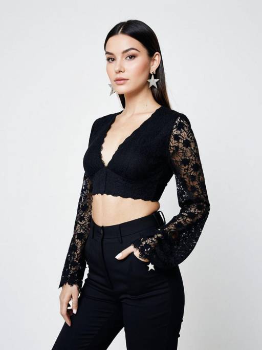 Woman in Black Lace Crop Top and High-Waisted Trousers