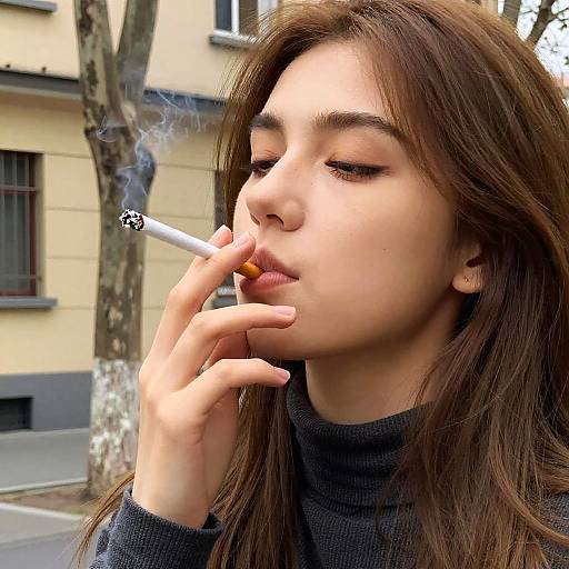 Young Woman Smoking Cigarette Outdoors