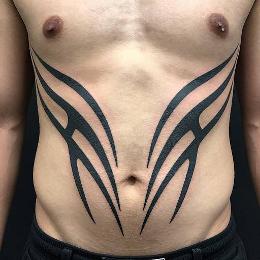 Symmetrical Tribal Blackwork Stomach Tattoo