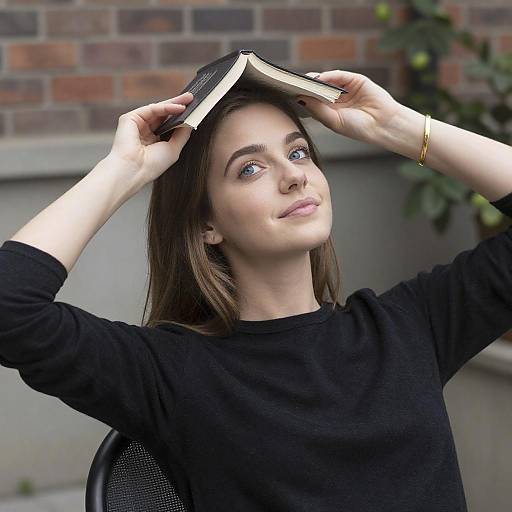 Playful Woman with Book Outdoors