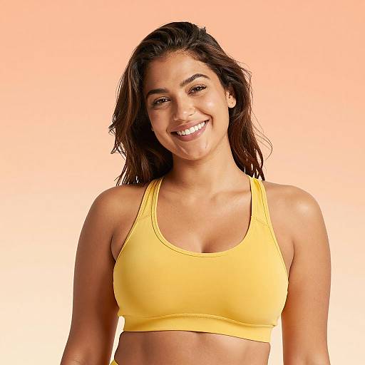 Smiling Woman in Yellow Sports Bra