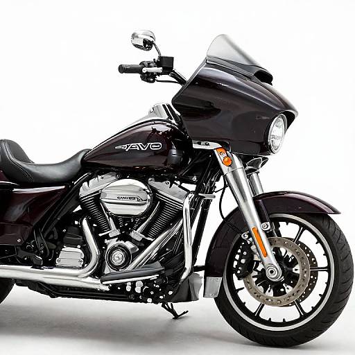 Photograph of a sleek, black Harley-Davidson motorcycle with chrome accents, large front wheel, and a windscreen, against a white background.