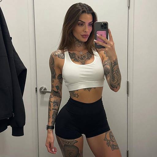 Tattooed Woman Mirror Selfie