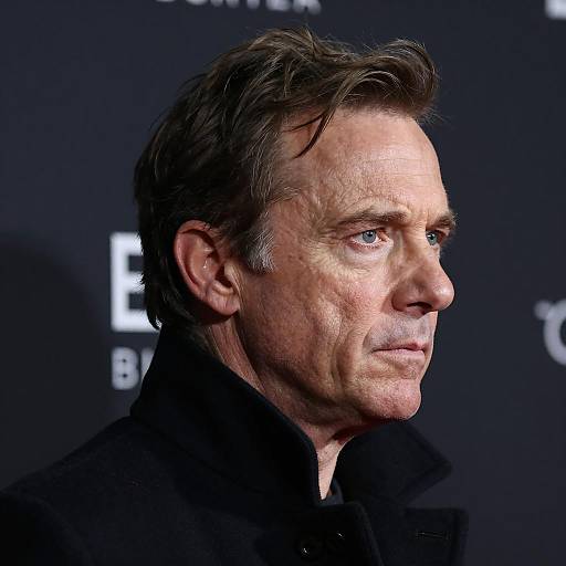 Profile of Middle-Aged Man in Dark Coat