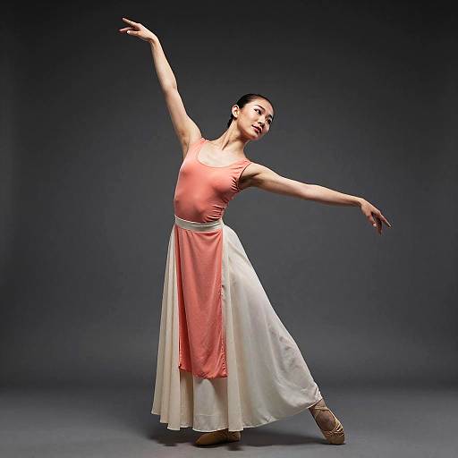 Photograph of a graceful woman in a peach sleeveless top and white skirt with pink accents, balancing on one leg in an elegant dance pose against a