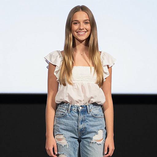 Young Woman Smiling in Casual Denim