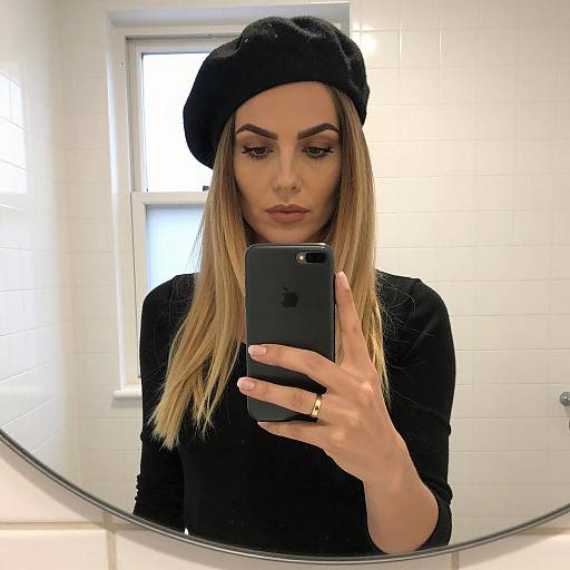 Chic Mirror Selfie in Elegant Bathroom