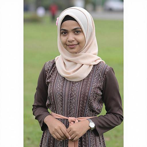 Young Woman in Beige Hijab Outdoors