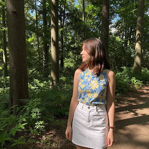 Young Woman in Sunlit Forest Setting