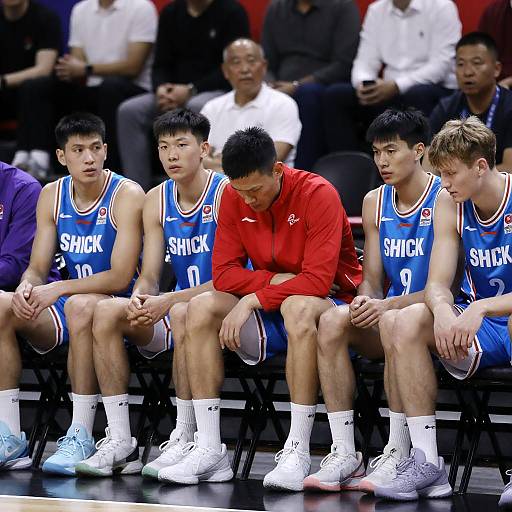 Intense Basketball Team on Bleachers