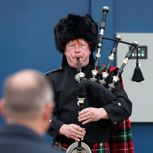 Man in Kilt Playing Bagpipes