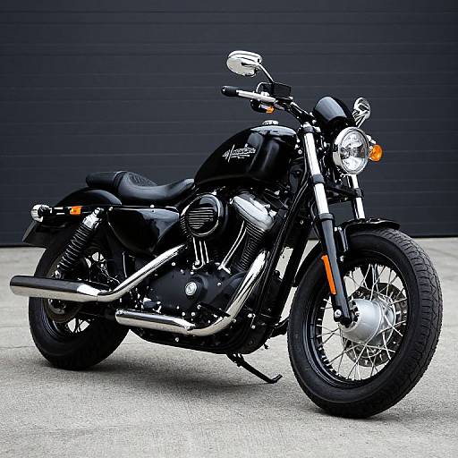 Photograph of a sleek, black Harley-Davidson motorcycle with chrome accents, side mirrors, and orange turn signals, parked on a concrete surface against
