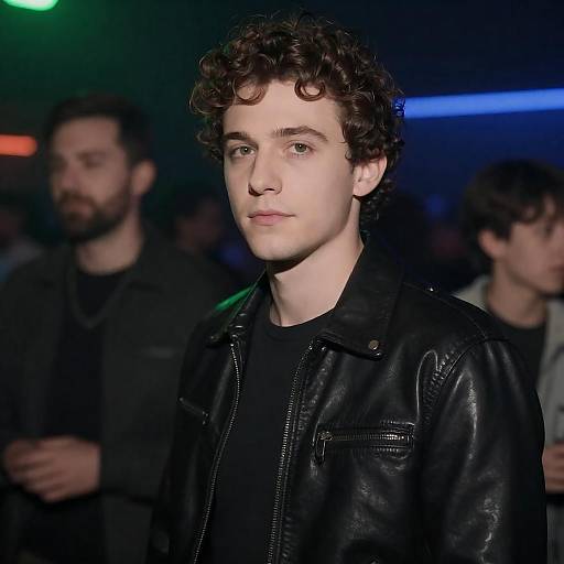 Curly-Haired Man in Neon Nightclub