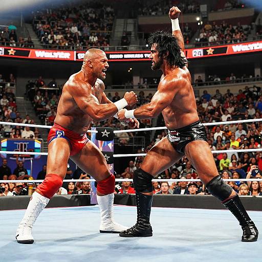 Photorealistic CGI of two muscular male wrestlers in a ring, one bald in red trunks, the other with long hair in black trunks,