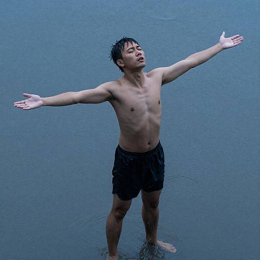 Man Embracing the Rain's Intensity