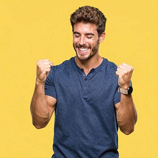 Excited Young Man Celebrating Victory