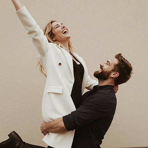 Warm Sepia: Bearded Man Lifts Blonde