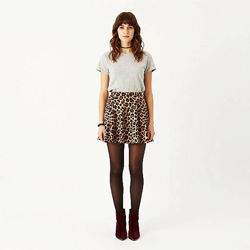 Young Woman in Leopard Print Skirt