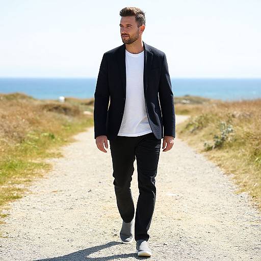 Handsome Man Walking by Seaside Path