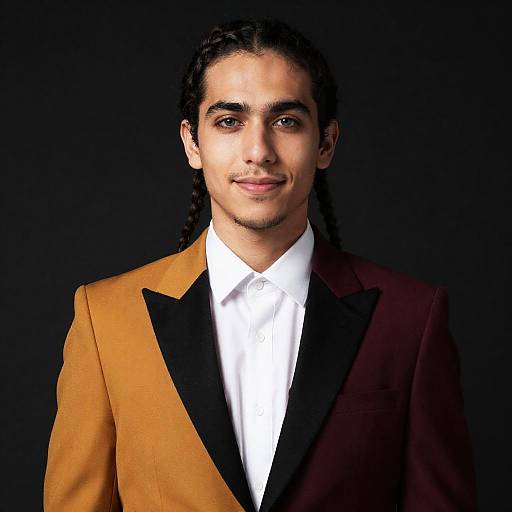 Young Man in Two-Tone Formal Suit with Braided Hair