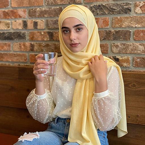 Young Woman in Yellow Hijab Indoors