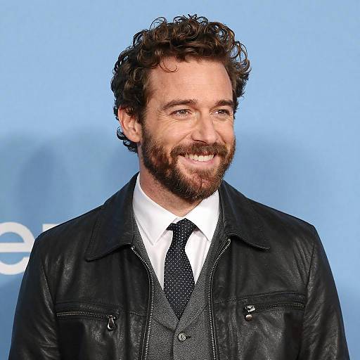 Smiling Man in Stylish Outfit Portrait