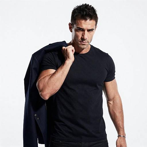 High-Contrast Muscular Man Studio Portrait