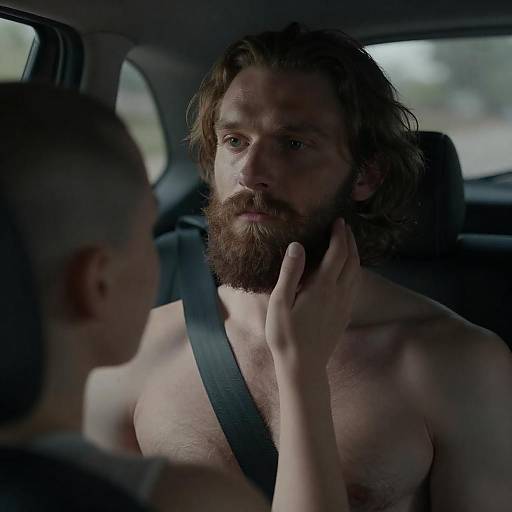 Intimate Portrait of Contemplation in Dim Light