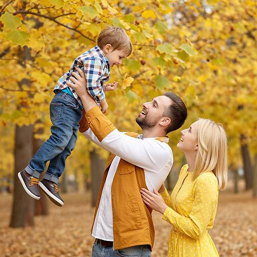 Photograph of a bearded man in a white and brown jacket, holding a plaid-shirted boy, with a smiling blonde woman in a yellow