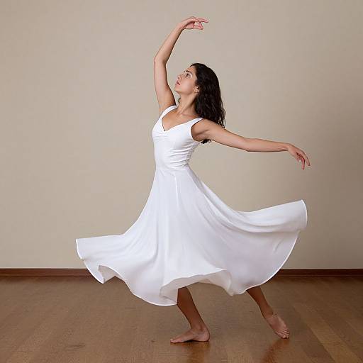 Woman Dancing in White Dress