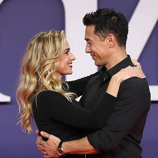 Joyful Couple Dancing in Abstract Setting