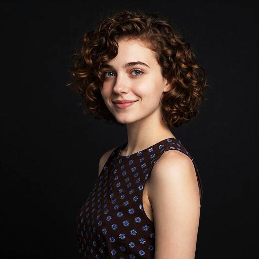Young Woman with Curly Hair Smiling